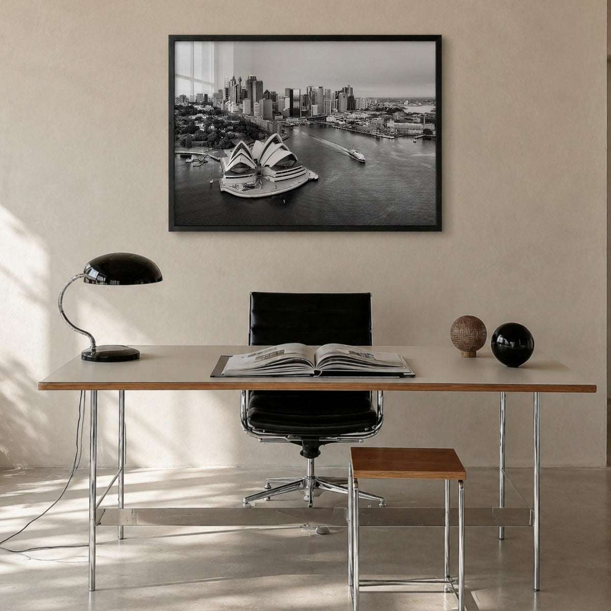 Australia black & white photo poster of Oceania – horizontal wall art in black wood frame, hanging on wall