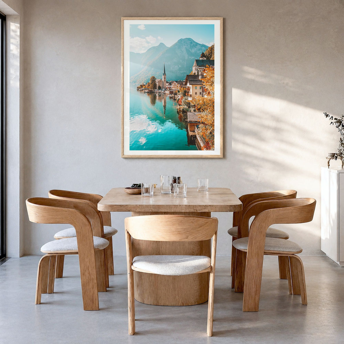 Austria Photo Poster in a natural wood frame, hanging in a dining room, white border