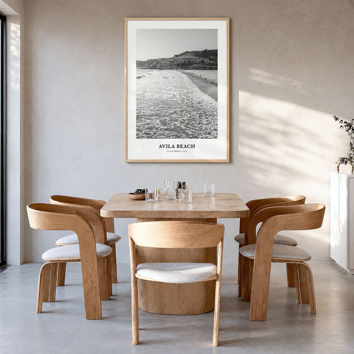 Avila Beach Classic No 1 Poster in a natural wood frame, hanging in a dining room