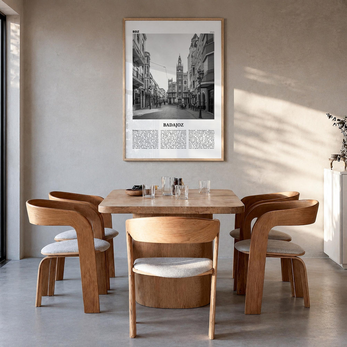 Badajoz black & white newspaper poster of Spain – vertical wall art in natural wood frame, hanging on wall