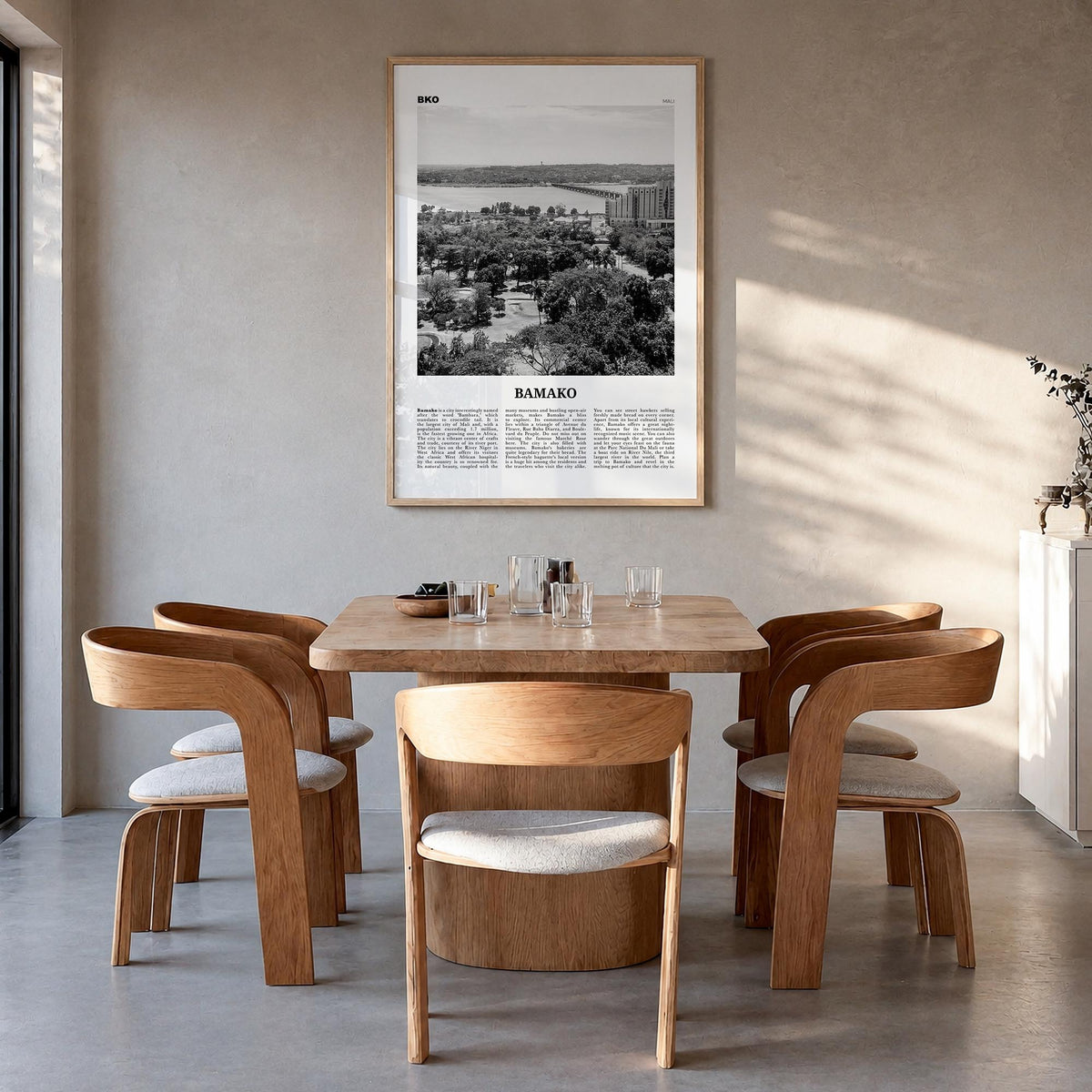 Bamako black & white newspaper poster of Mali – vertical wall art in natural wood frame, hanging on wall