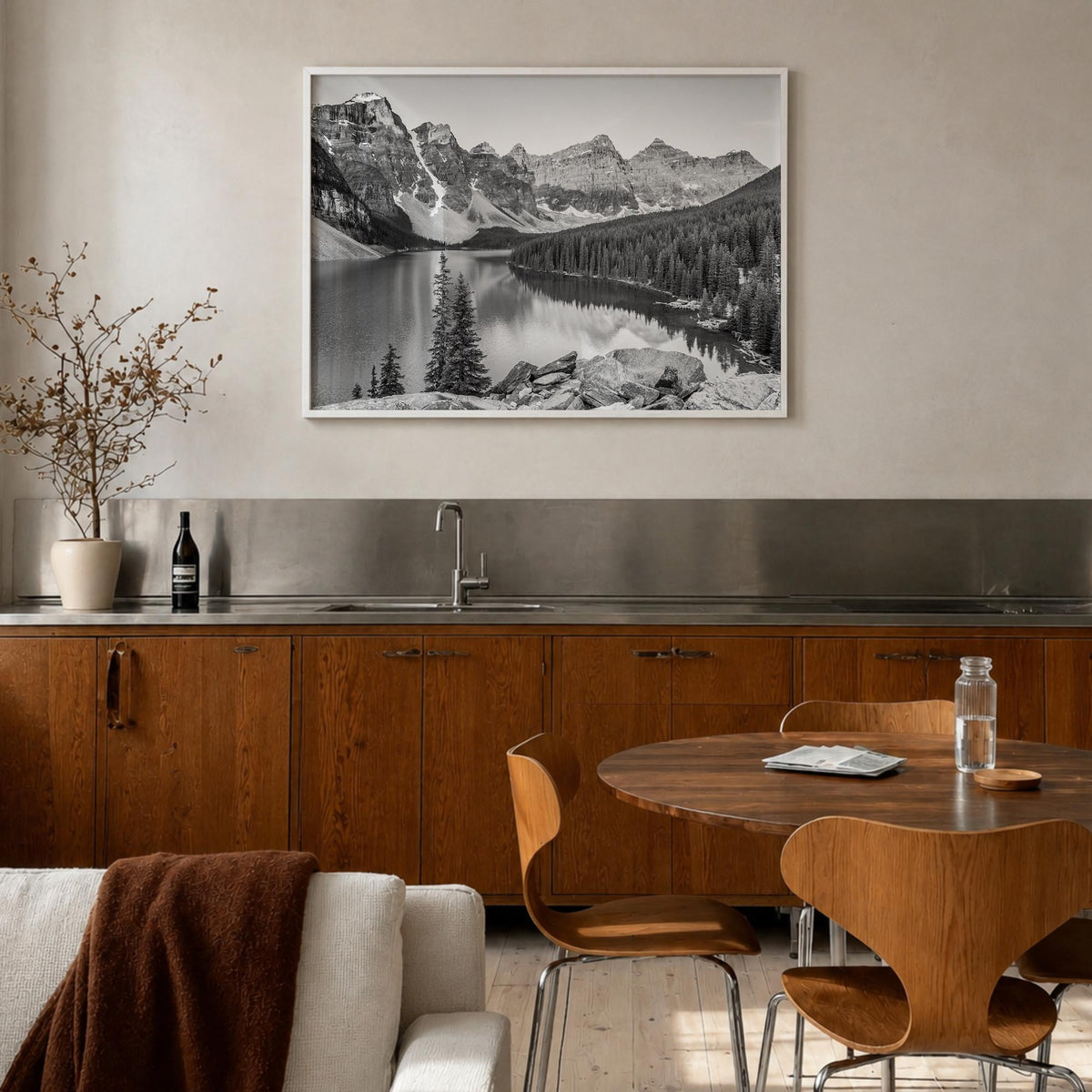 Banff black & white photo poster of Alberta, Canada – horizontal wall art in white wood frame, hanging on wall