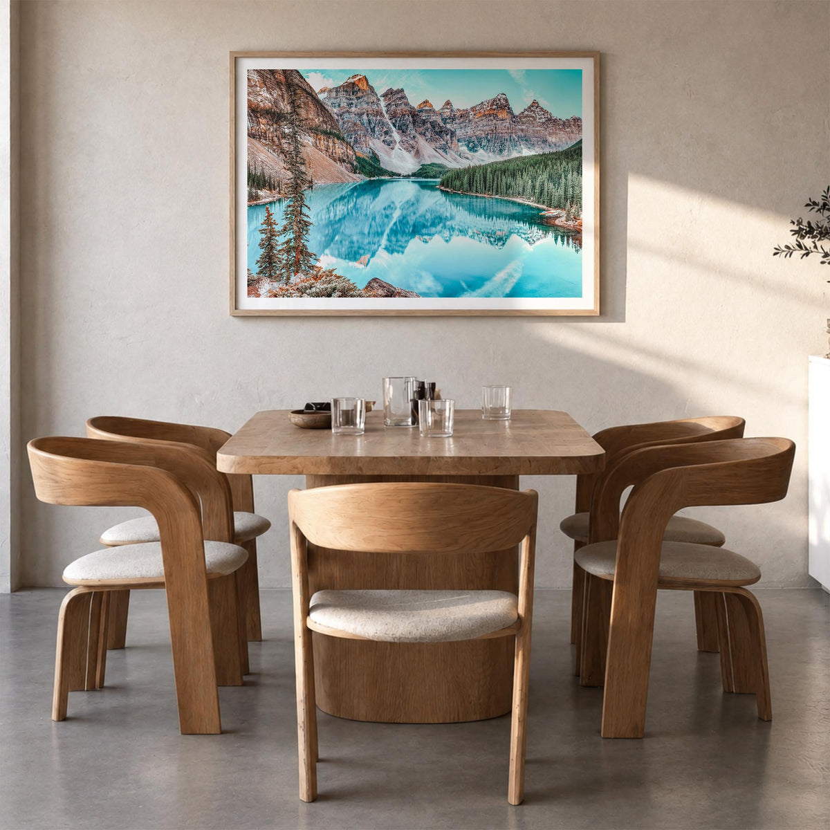Banff colorful photo poster of Alberta, Canada – horizontal wall art in natural wood frame with white border, hanging on wall