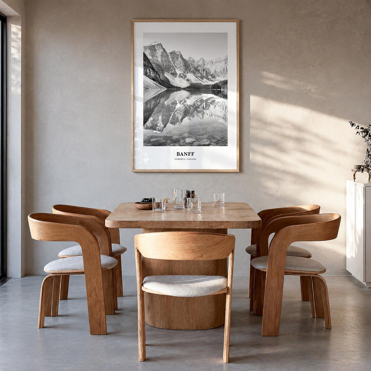 Banff no. 1 black & white classic poster of Alberta, Canada – vertical wall art in natural wood frame, hanging on wall