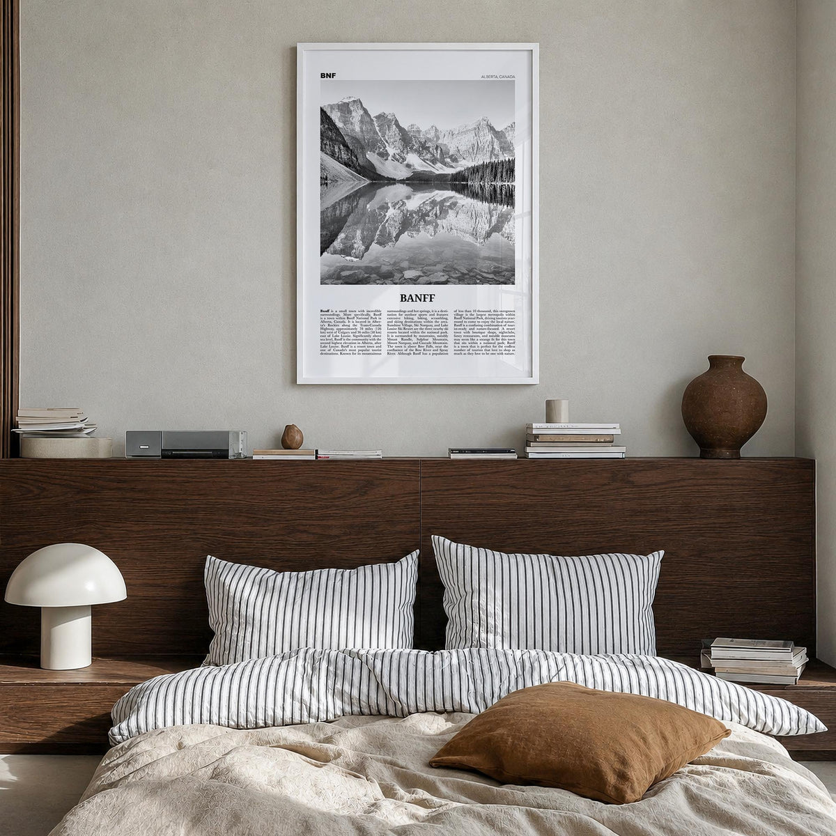 Banff no. 1 black & white newspaper poster of Alberta, Canada – vertical wall art in white wood frame, hanging on wall