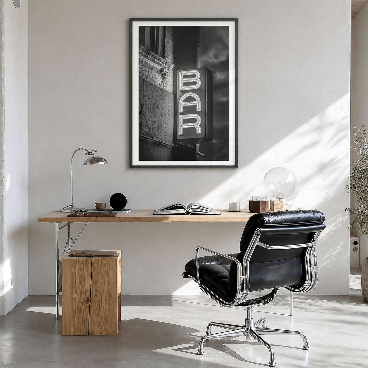 Bar Sign Photo Poster in a black wood frame, hanging in a bright home office, white border