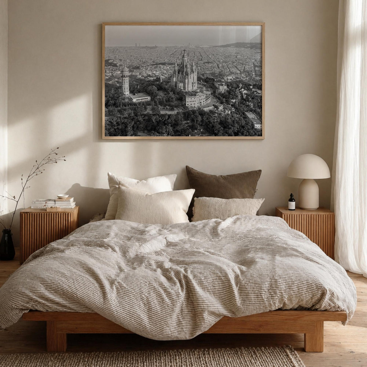 Barcelona black & white photo poster of Spain – horizontal wall art in natural wood frame, hanging on wall