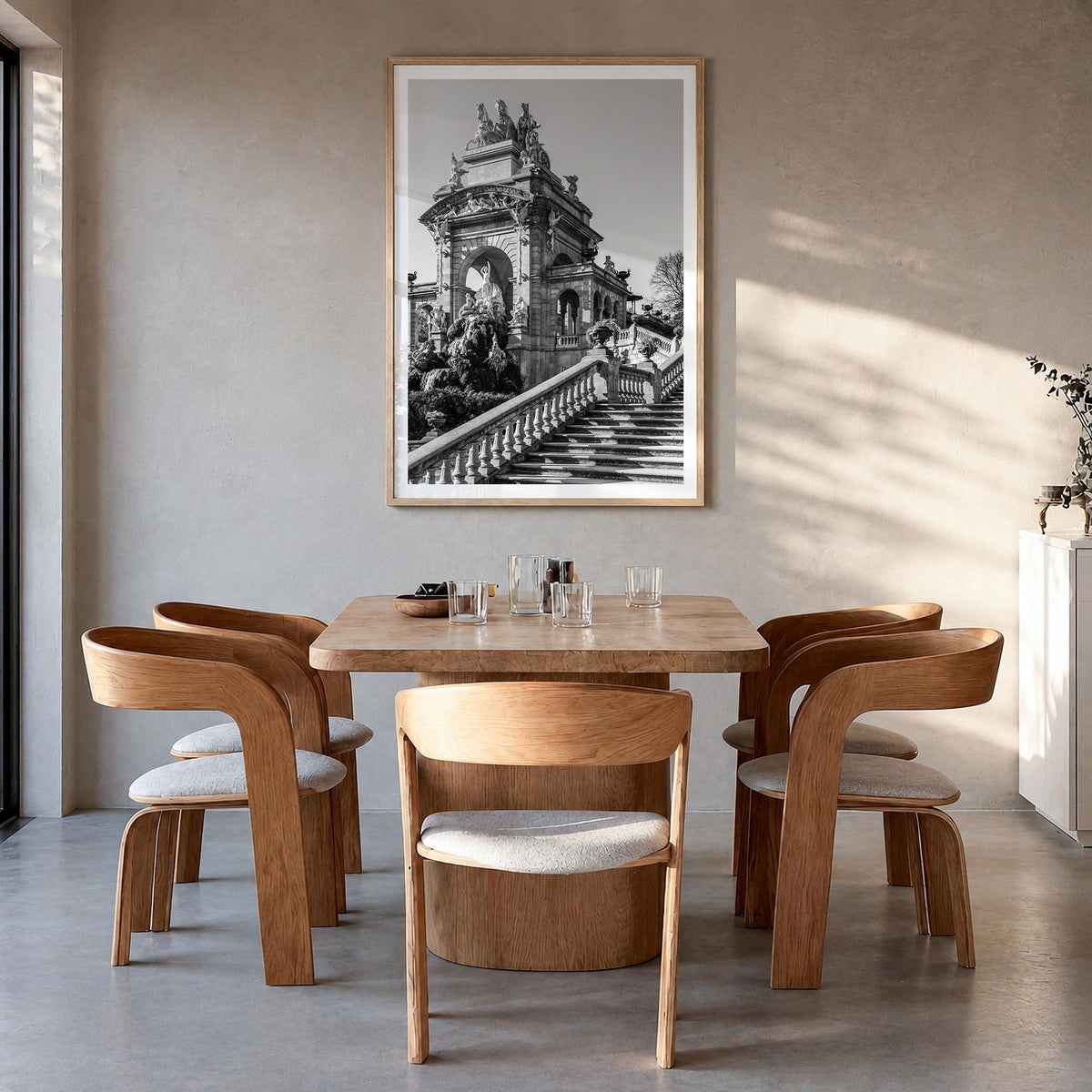 Barcelona no. 3 black & white photo poster of Spain – vertical wall art in natural wood frame with white border, hanging on w