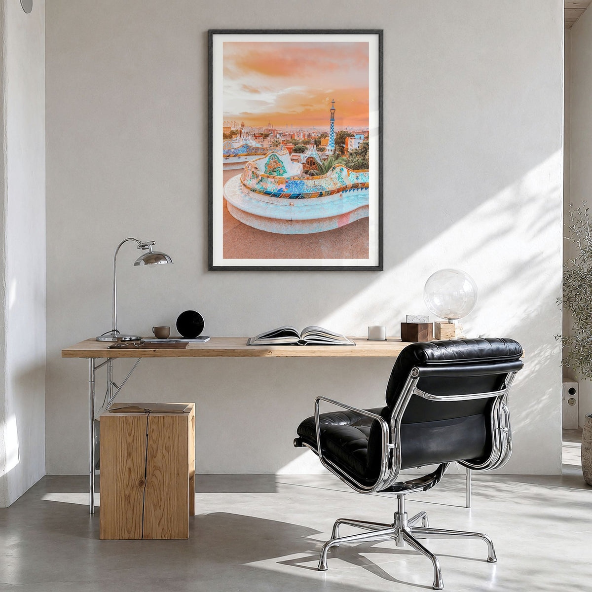 Barcelona Photo No 2 Poster in a black wood frame, hanging in a bright home office, white border