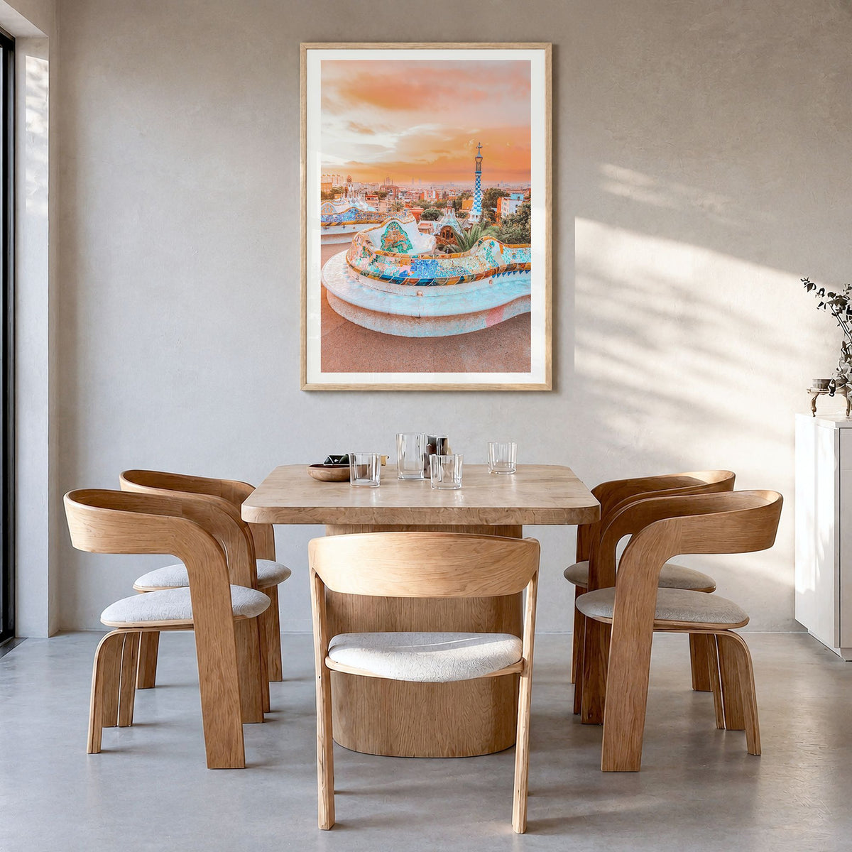 Barcelona Photo No 2 Poster in a natural wood frame, hanging in a dining room, white border