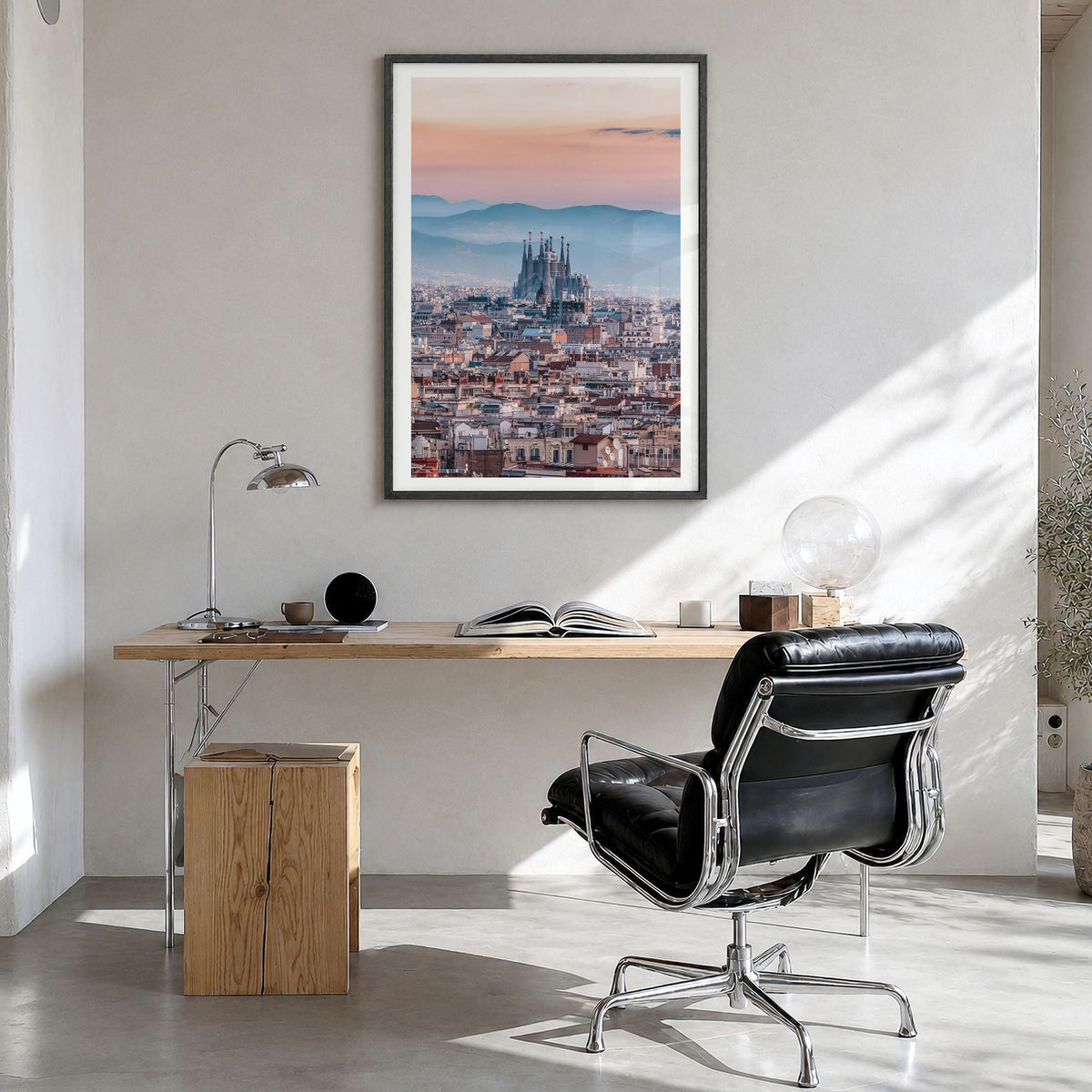 Barcelona Photo No 3 Poster in a black wood frame, hanging in a bright home office, white border