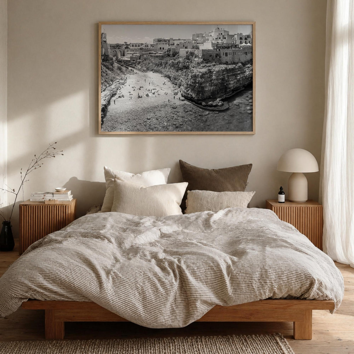 Bari black & white photo poster of Italy – horizontal wall art in natural wood frame, hanging on wall