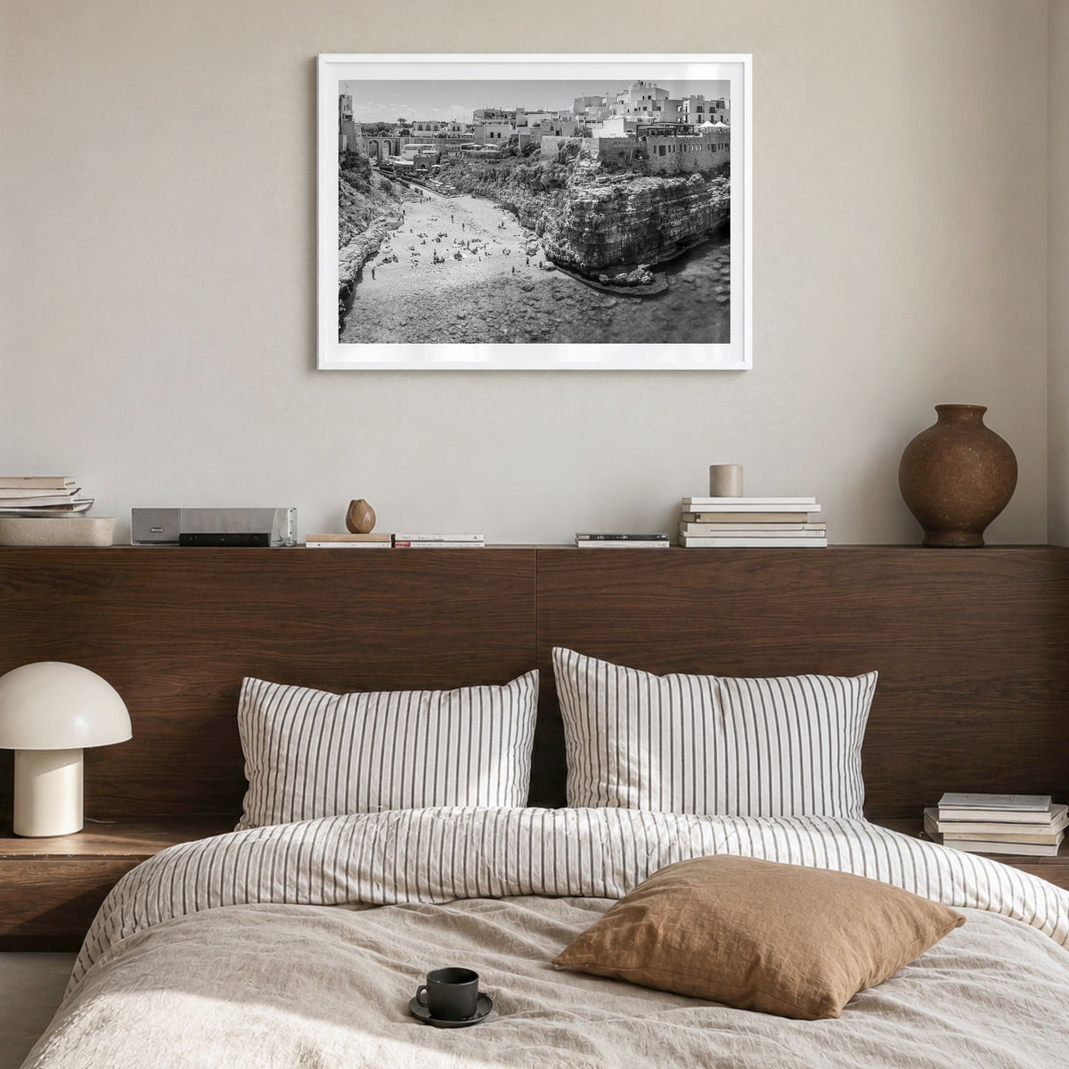 Bari Photo Poster in a white wood frame, hanging in a bedroom, white border