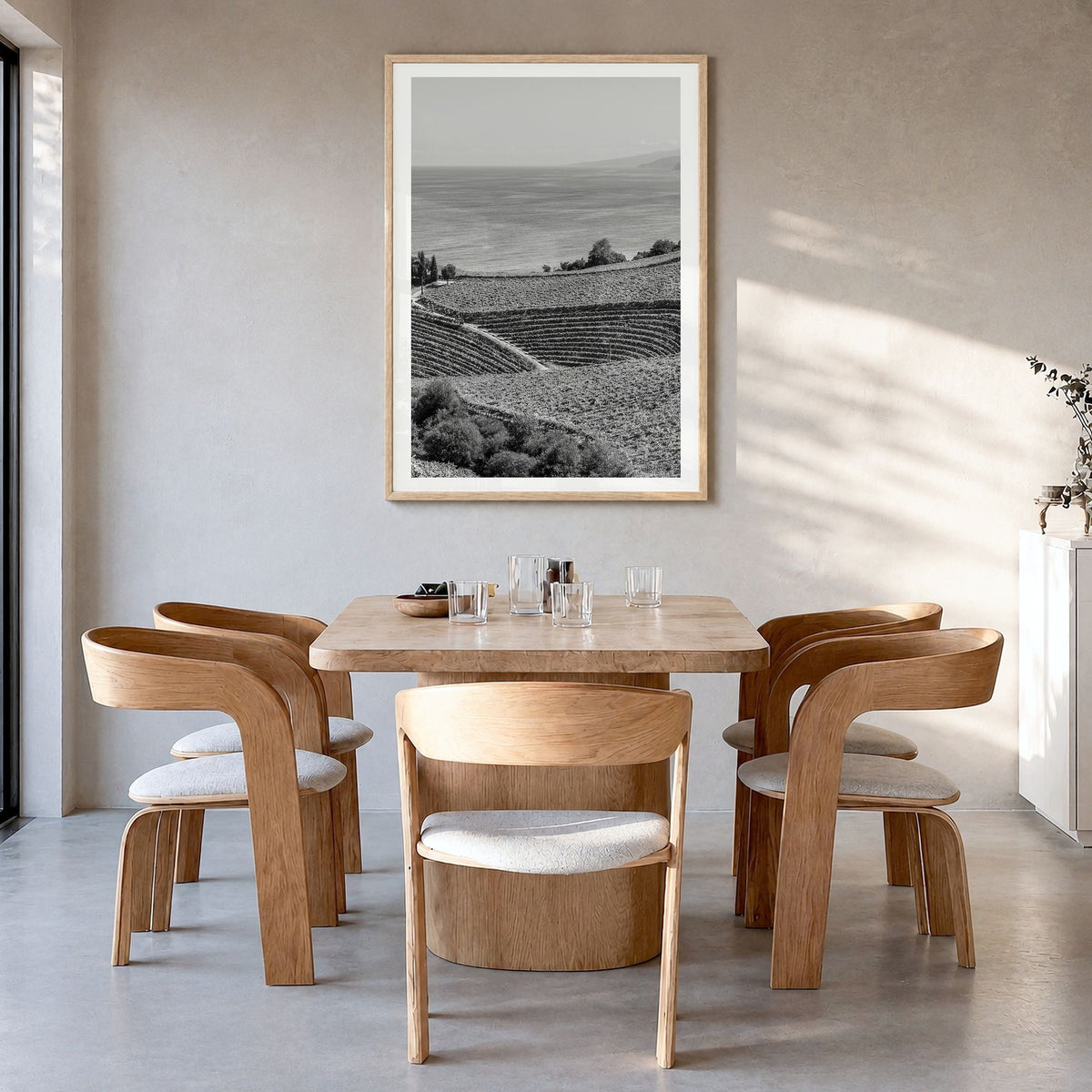 Basque Country Photo Poster in a natural wood frame, hanging in a dining room, white border