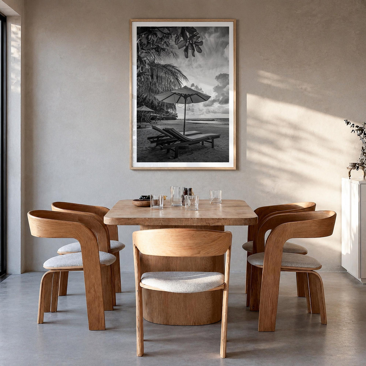 Beach no. 1 black & white photo poster – vertical wall art in natural wood frame with white border, hanging on wall