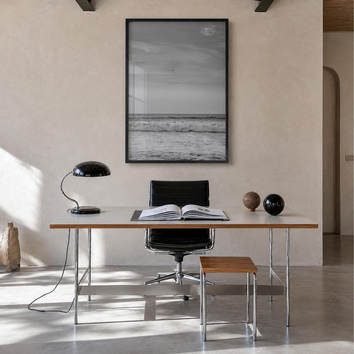 Beach no. 2 black & white photo poster – vertical wall art in black wood frame, hanging on wall