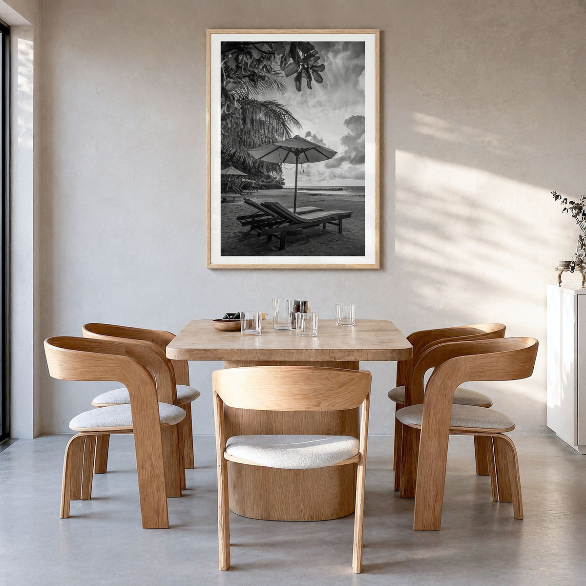 Beach Photo No 1 Poster in a natural wood frame, hanging in a dining room, white border