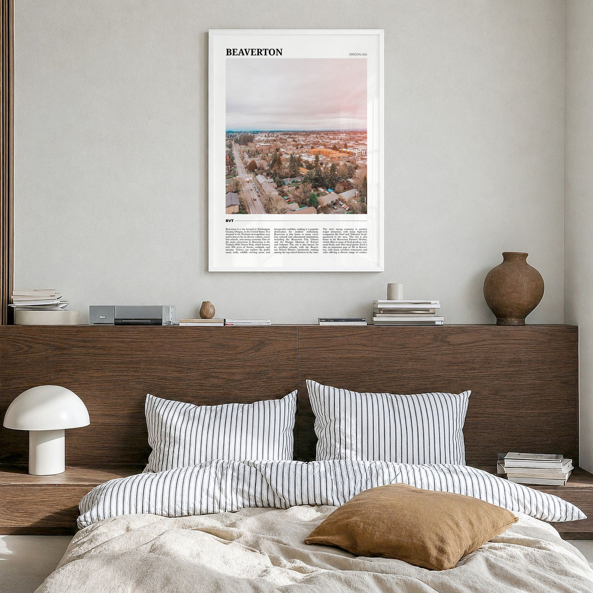 Beaverton Travel Poster in a white wood frame, hanging in a bedroom