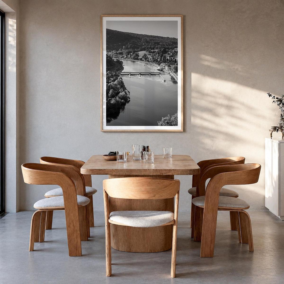 Belgium black & white photo poster of Europe – vertical wall art in natural wood frame with white border, hanging on wall