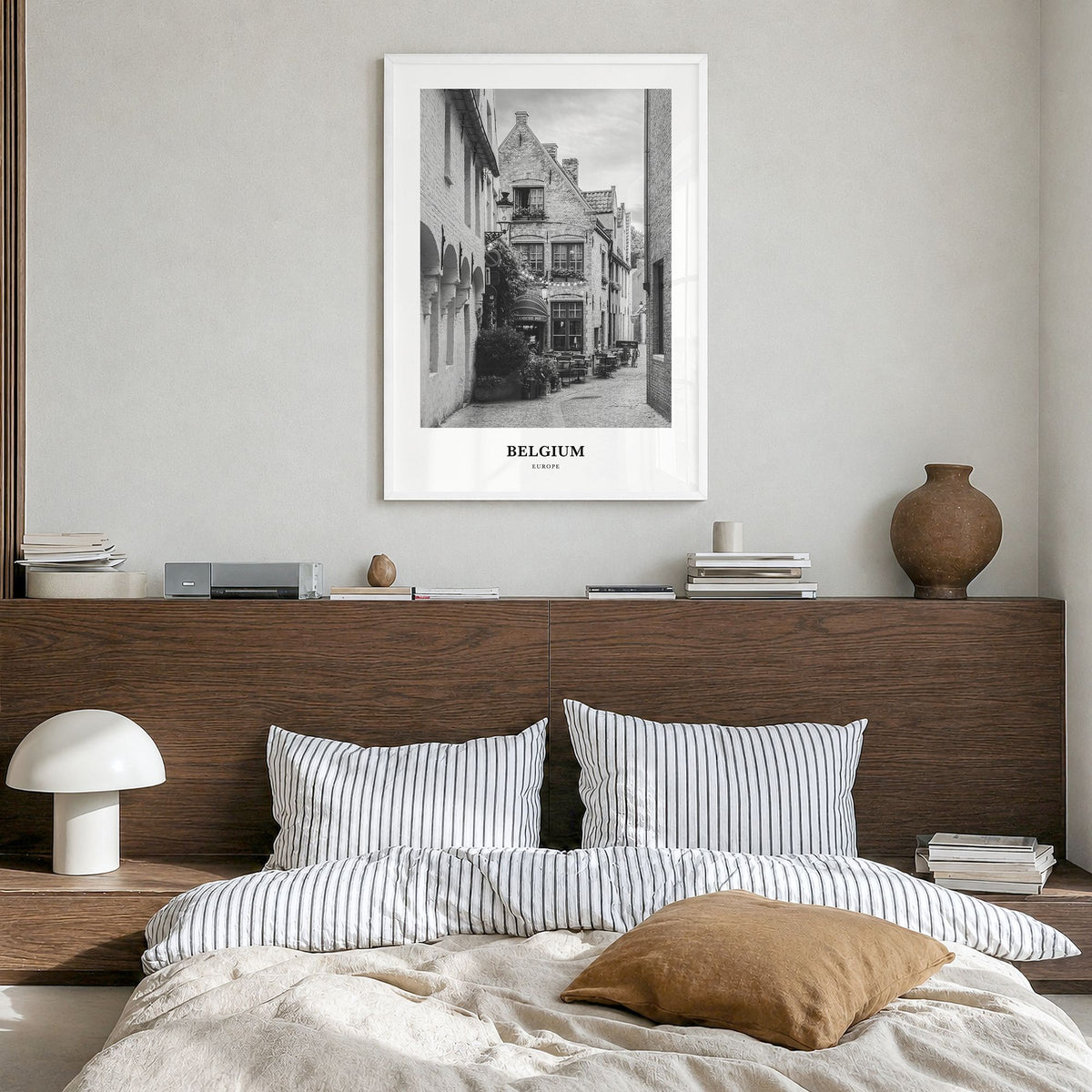 Belgium Classic No 4 Poster in a white wood frame, hanging in a bedroom