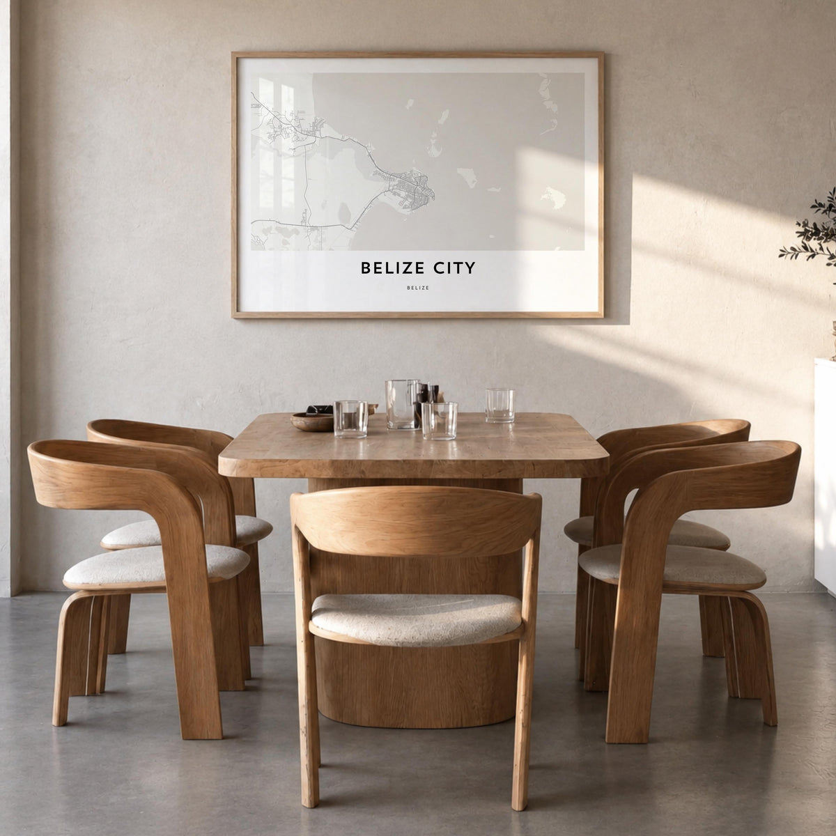 Belize City black & white map poster of Belize – horizontal wall art in natural wood frame, hanging on wall