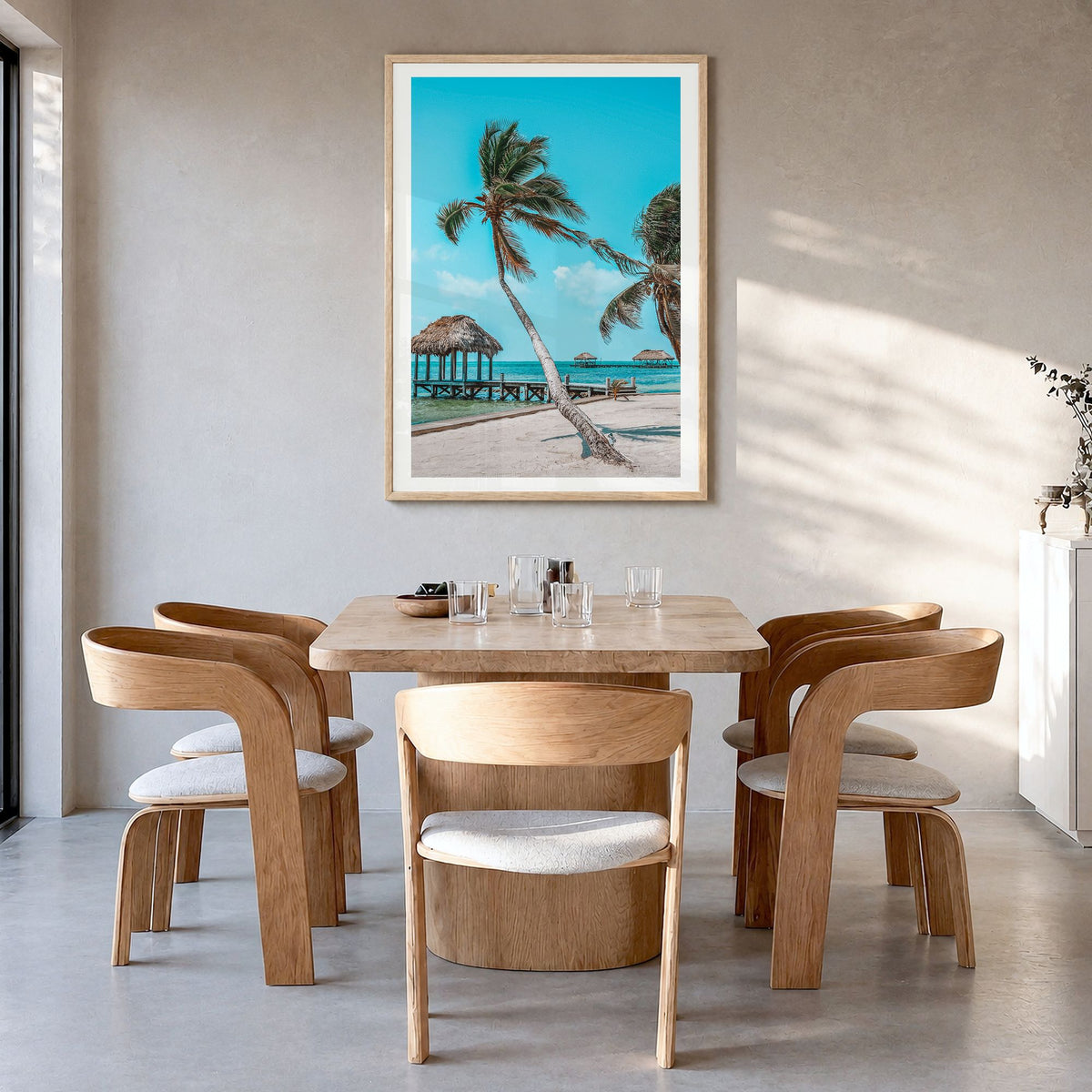 Belize Photo Poster in a natural wood frame, hanging in a dining room, white border