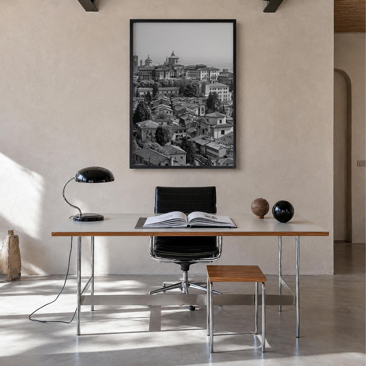 Bergamo black & white photo poster of Italy – vertical wall art in black wood frame, hanging on wall