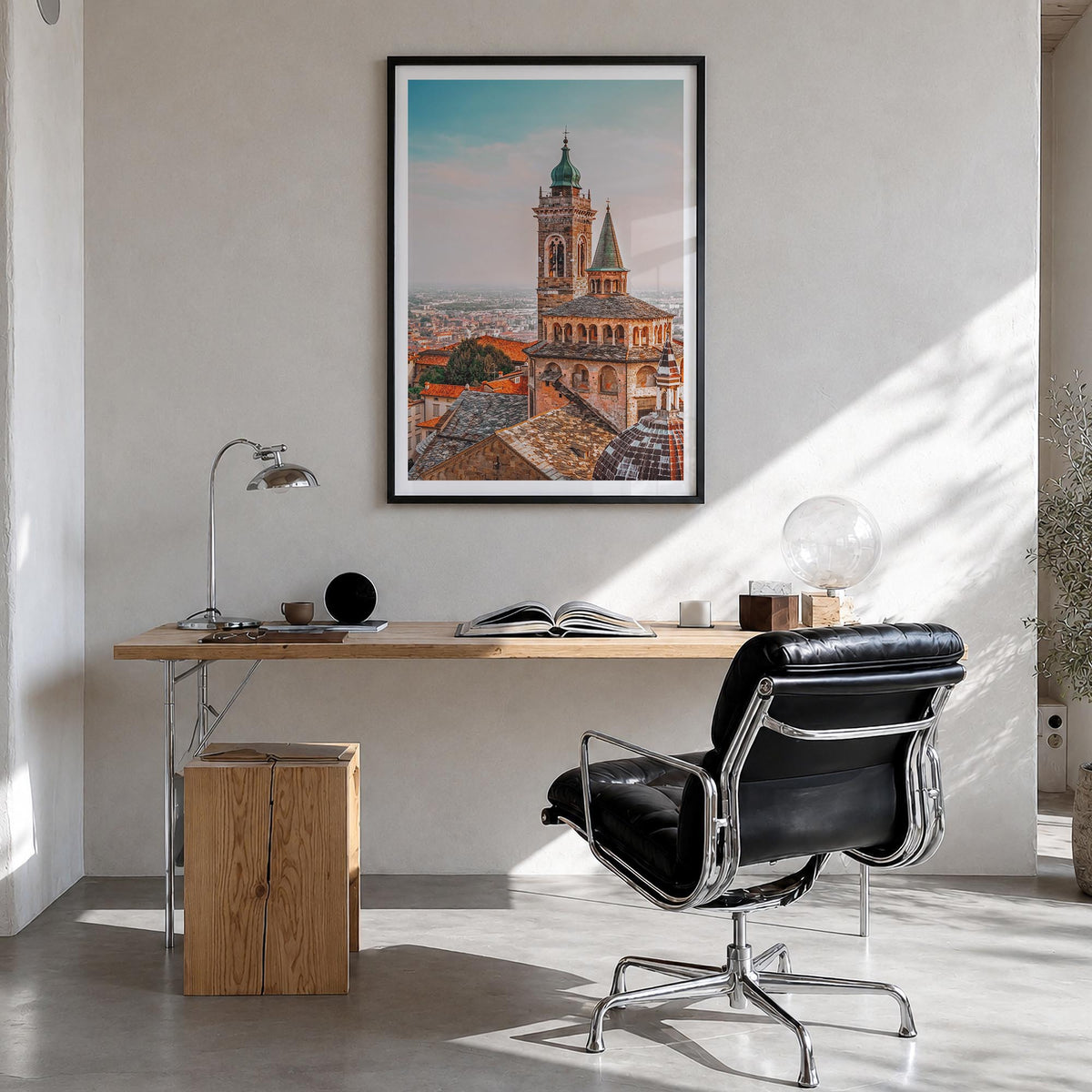 Bergamo colorful photo poster of Italy – vertical wall art in black wood frame with white border, hanging on wall
