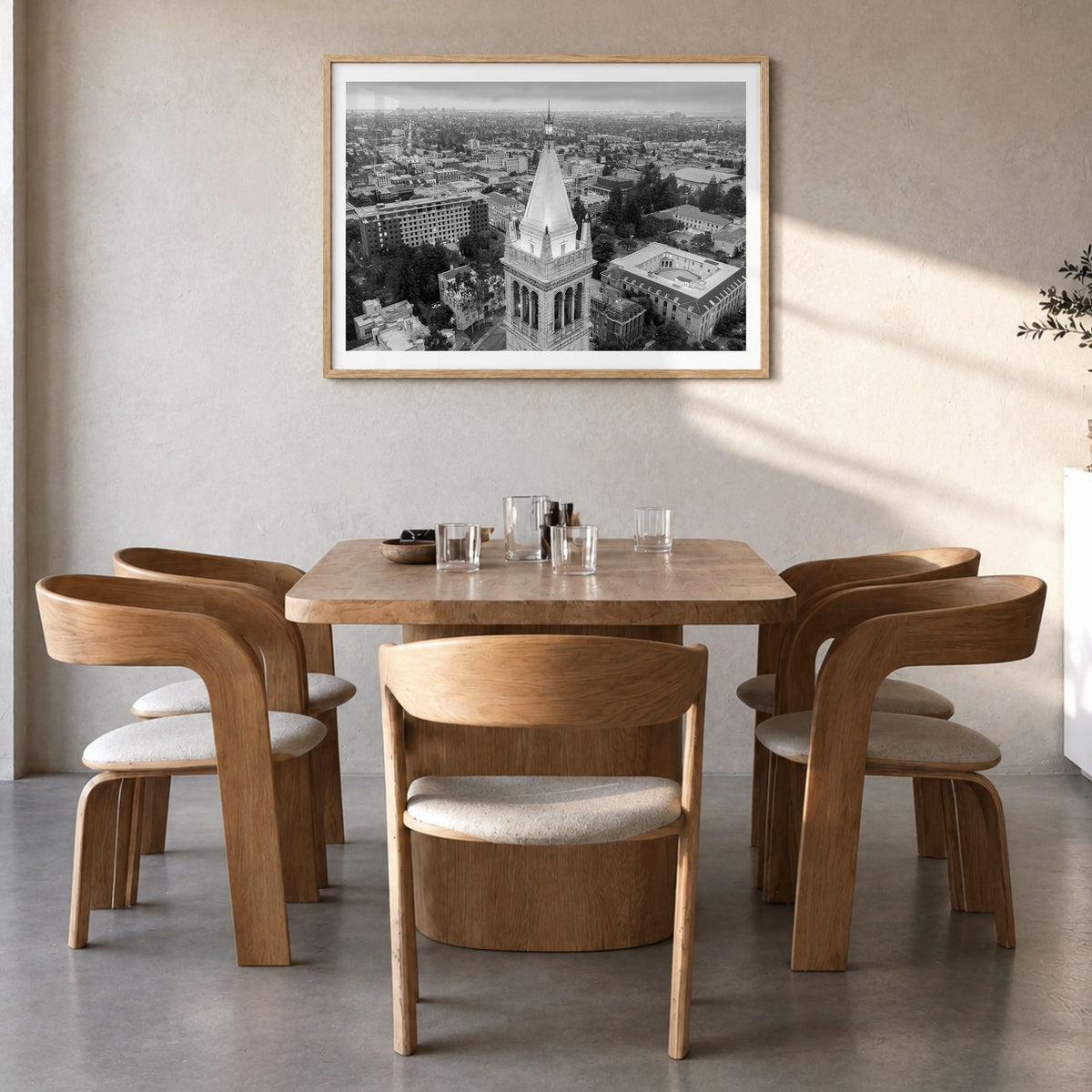Berkeley Photo Poster in a natural wood frame, hanging in a dining room, white border