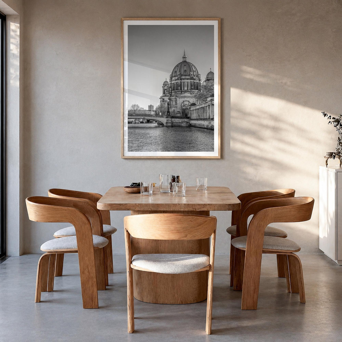 Berlin no. 2 black & white photo poster of Germany – vertical wall art in natural wood frame with white border, hanging on wa