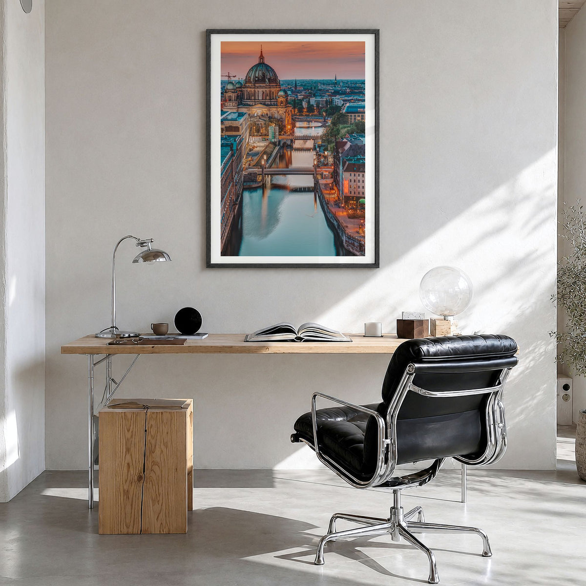 Berlin Photo No 3 Poster in a black wood frame, hanging in a bright home office, white border