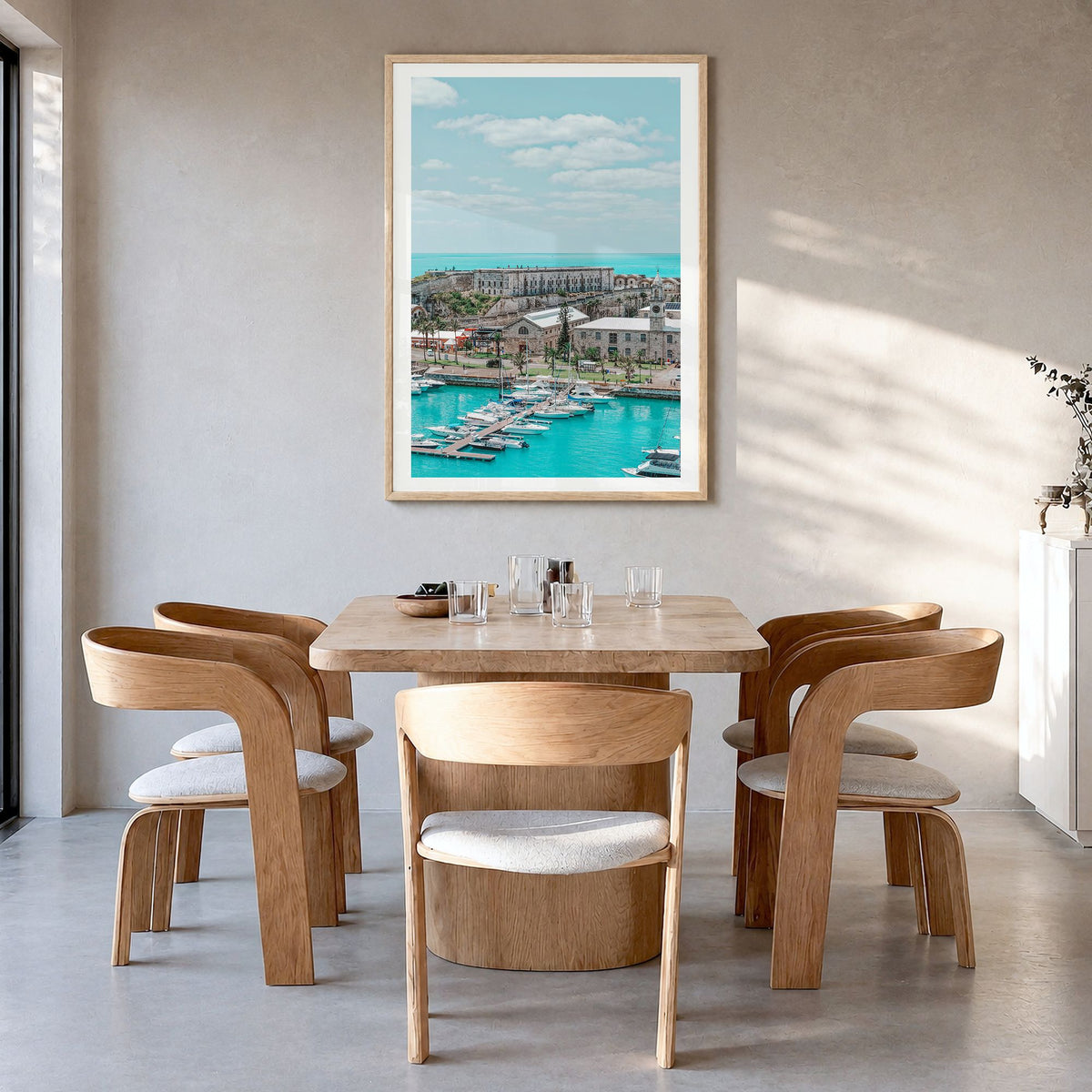 Bermuda Photo Poster in a natural wood frame, hanging in a dining room, white border
