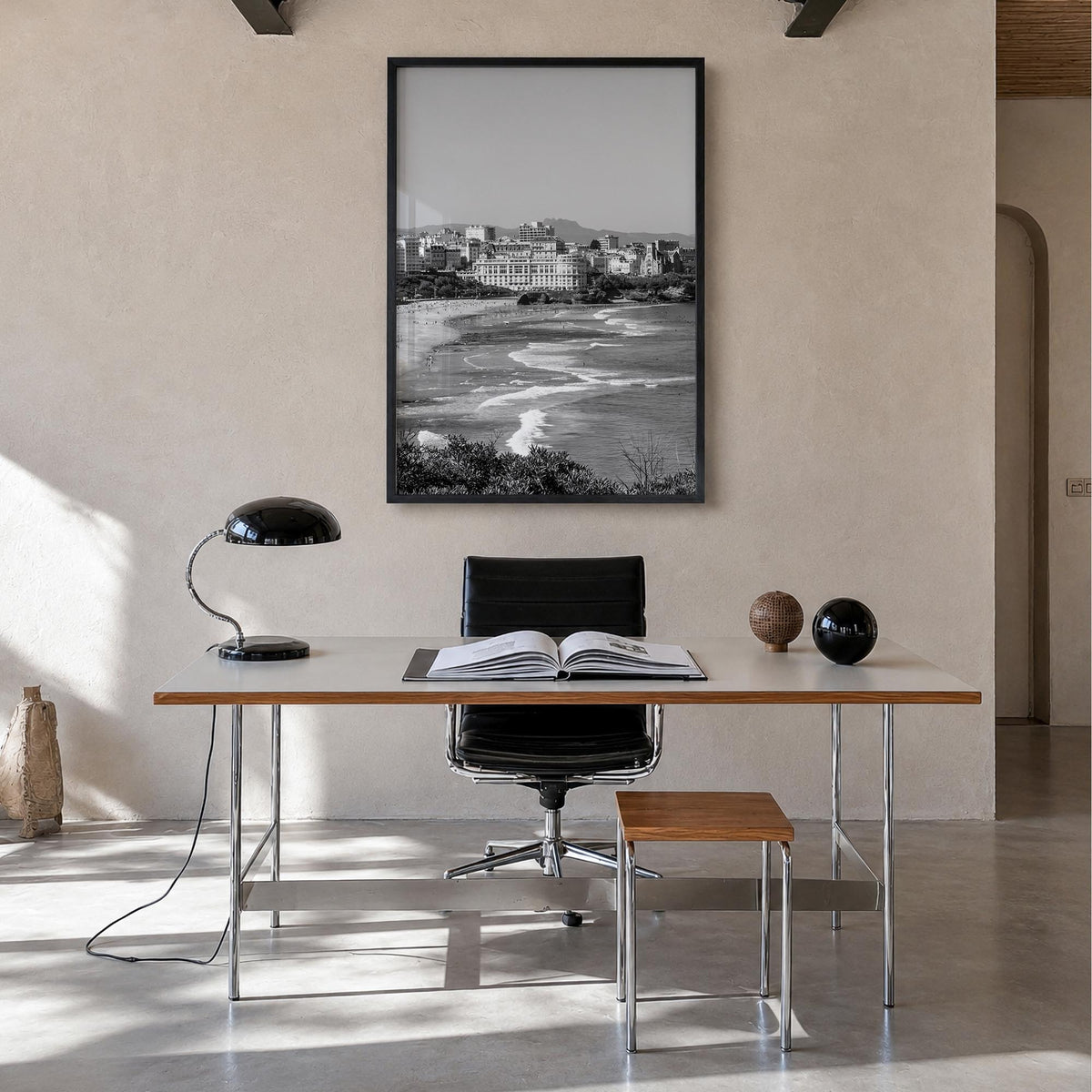 Biarritz black & white photo poster of France – vertical wall art in black wood frame, hanging on wall