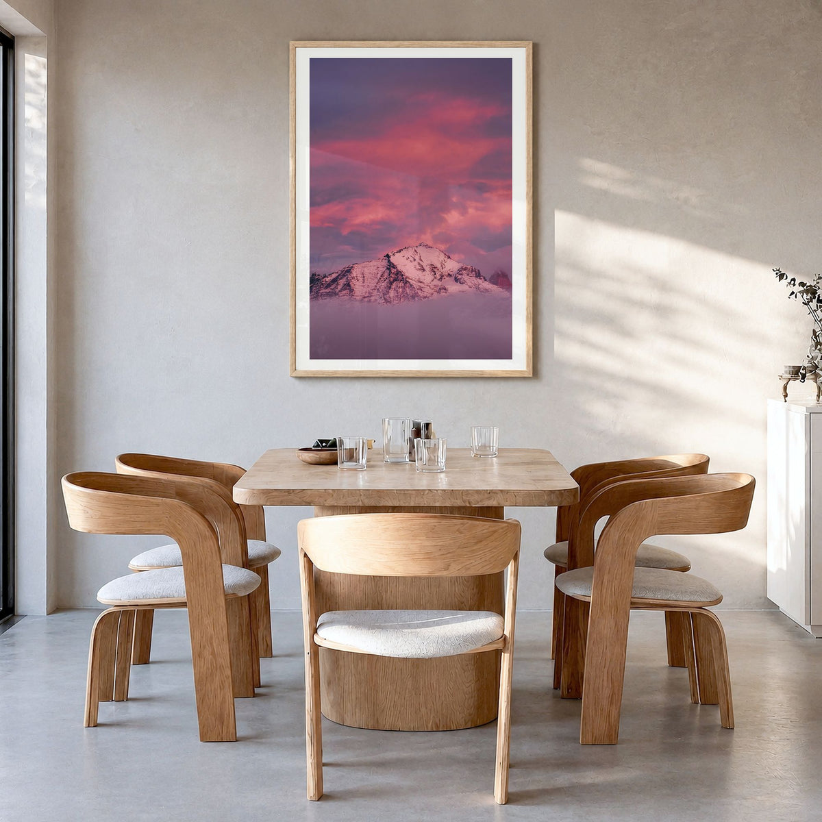 Big Sky Photo No 2 Poster in a natural wood frame, hanging in a dining room, white border