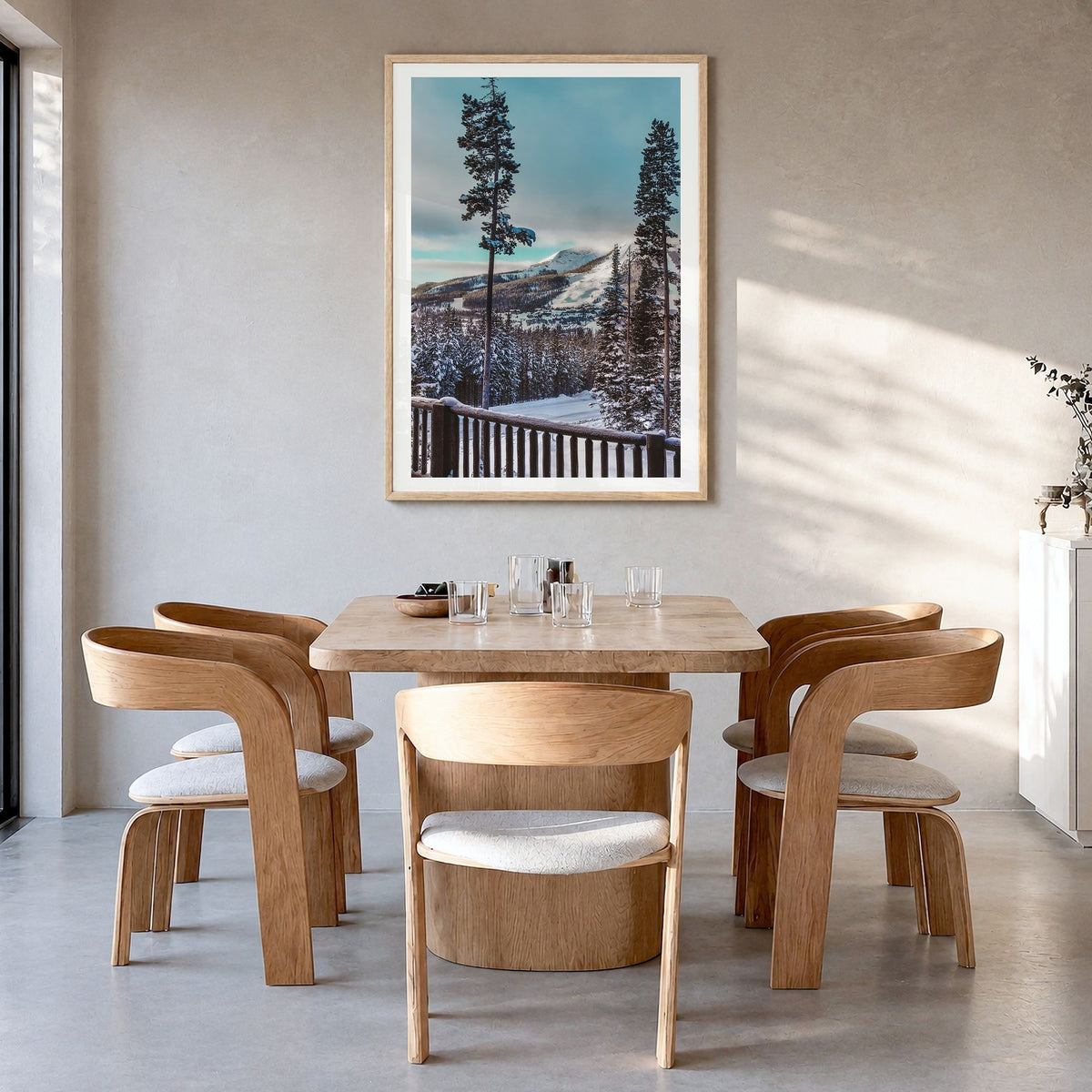 Big Sky Photo No 3 Poster in a natural wood frame, hanging in a dining room, white border