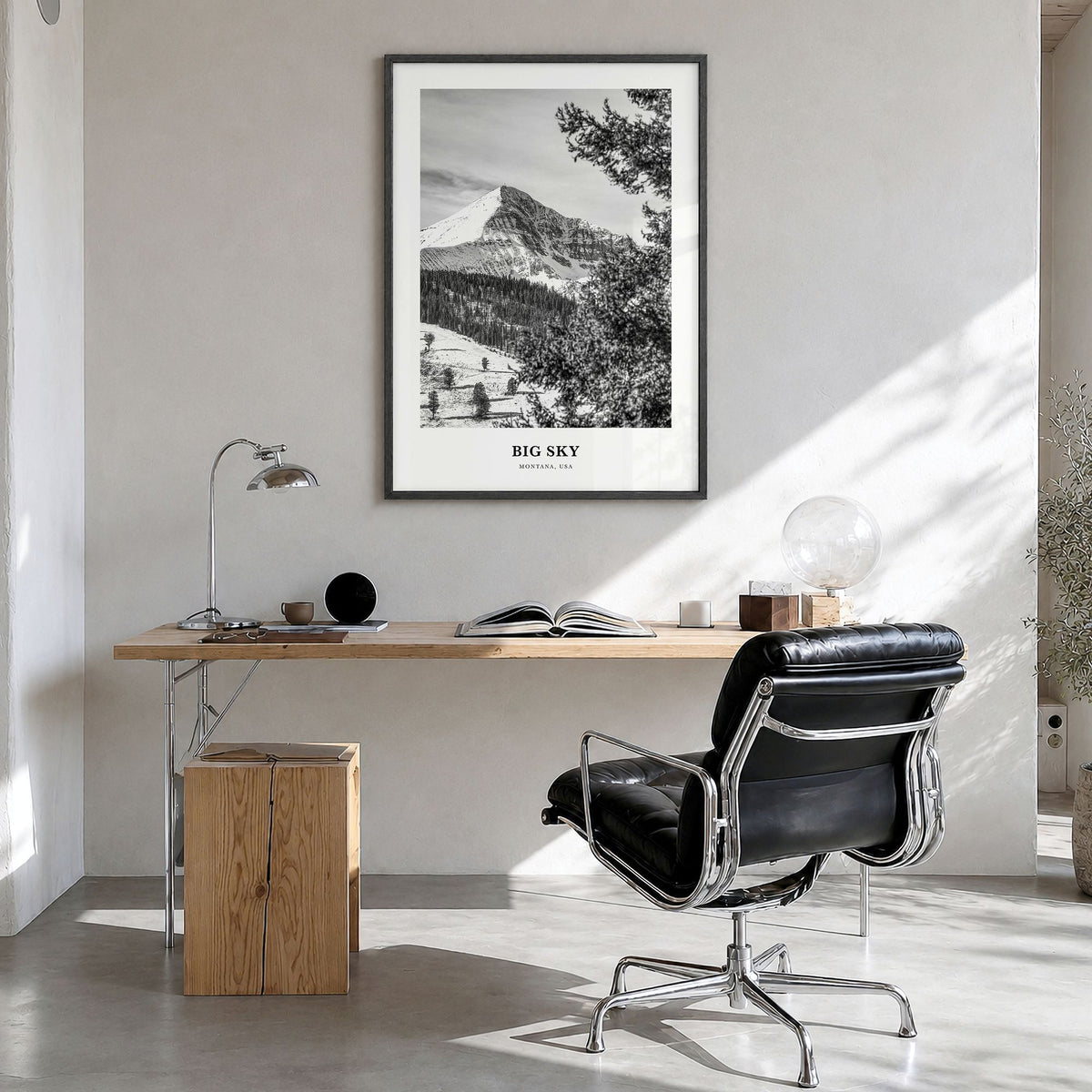 Big Sky Classic Poster in a black wood frame, hanging in a bright home office