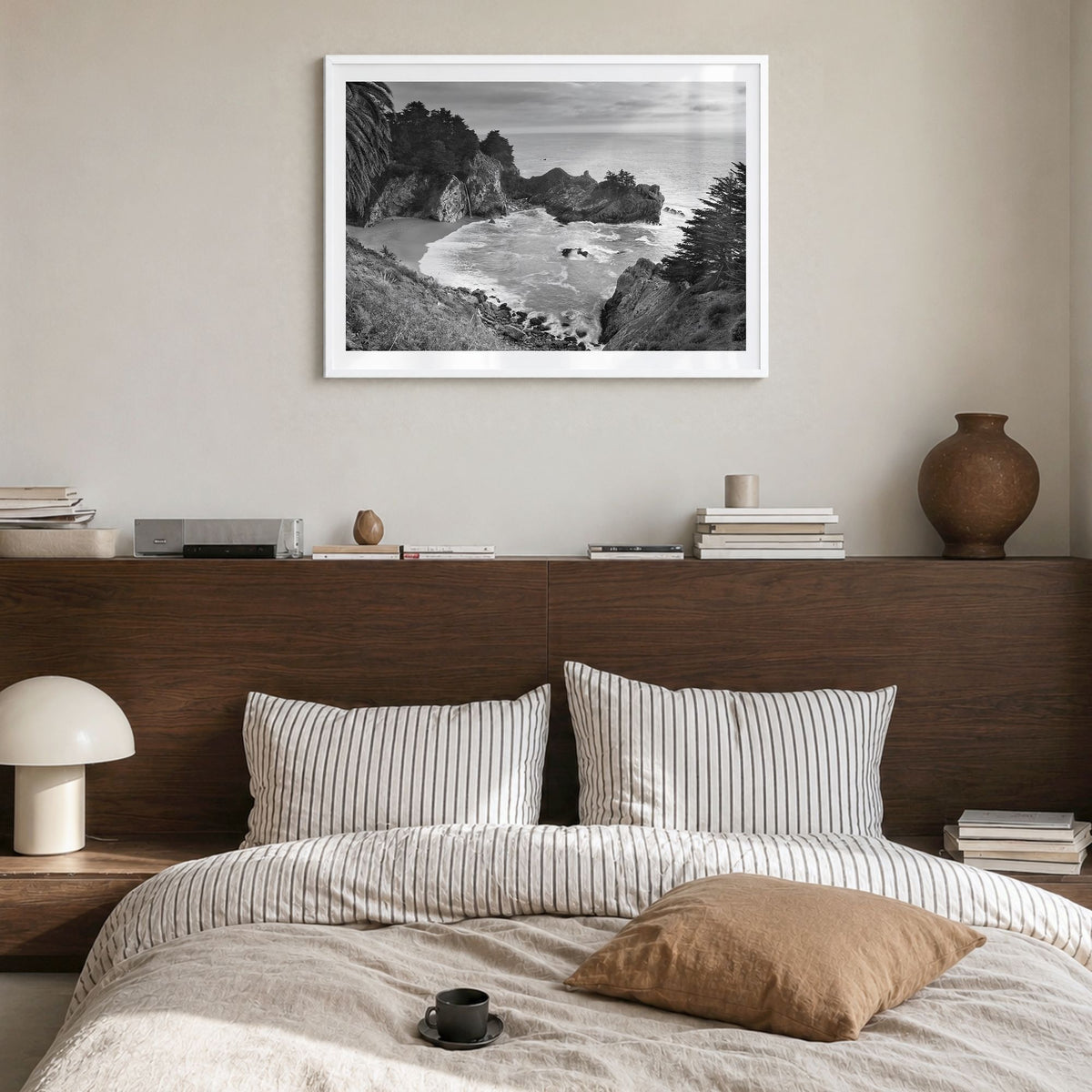 Big Sur Photo Poster in a white wood frame, hanging in a bedroom, white border