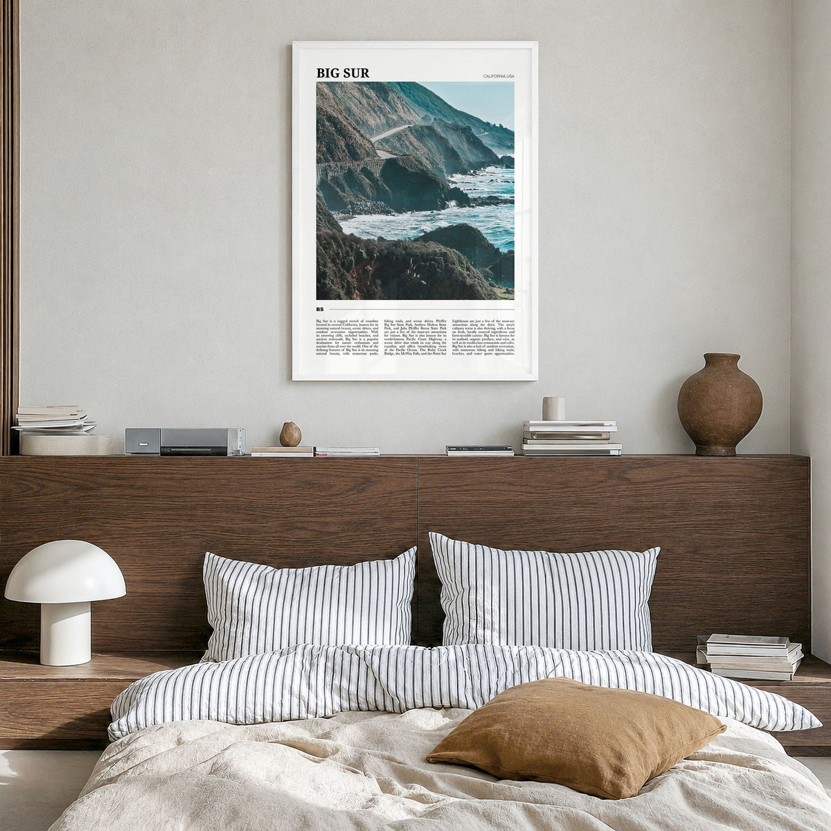 Big Sur Travel No 2 Poster in a white wood frame, hanging in a bedroom