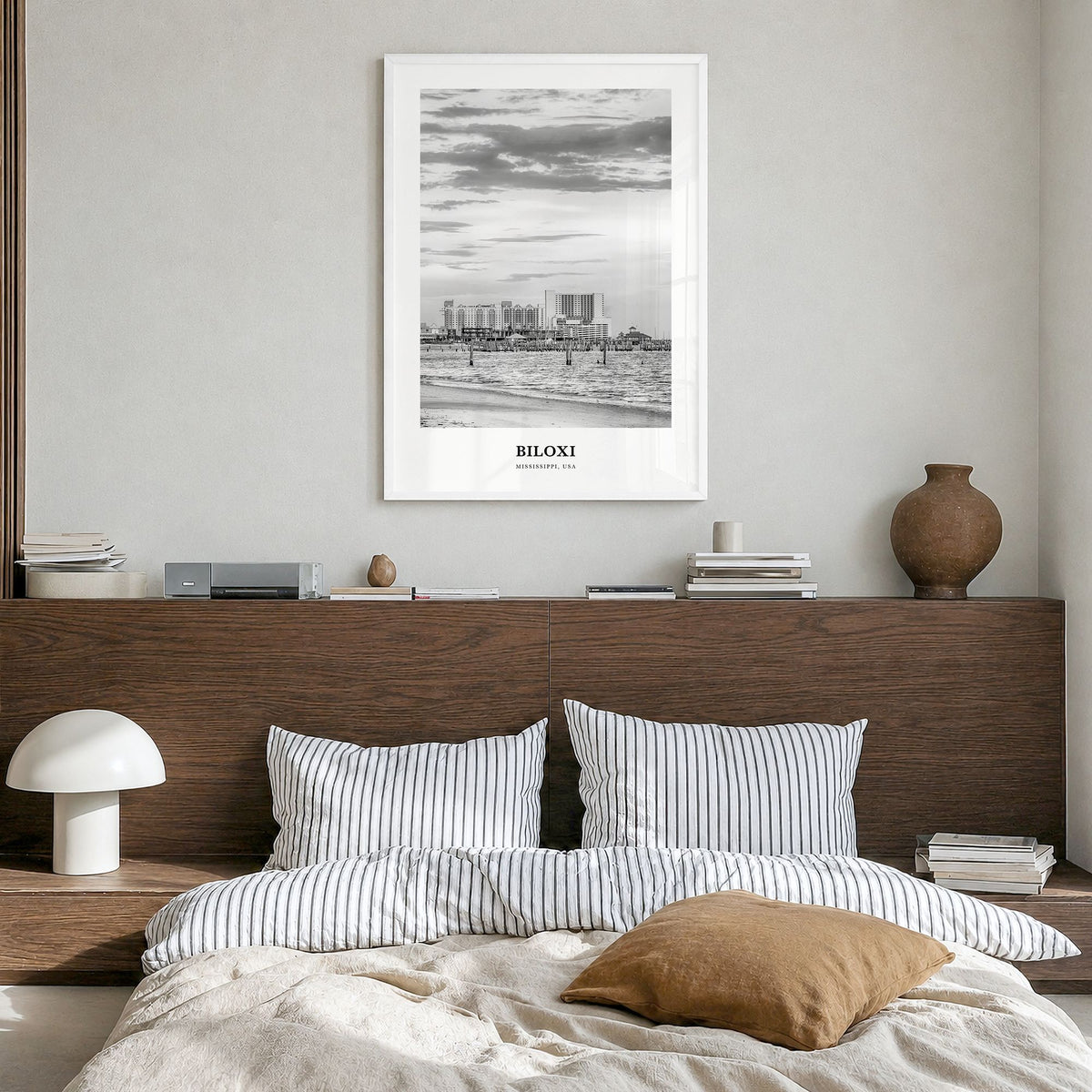 Biloxi Classic Poster in a white wood frame, hanging in a bedroom