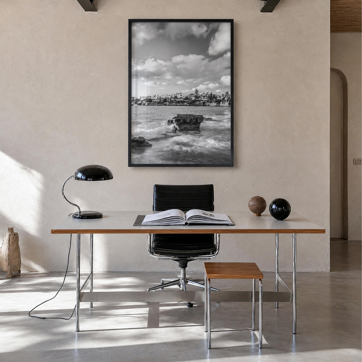 Bird Rock black & white photo poster of San Diego, California – vertical wall art in black wood frame, hanging on wall