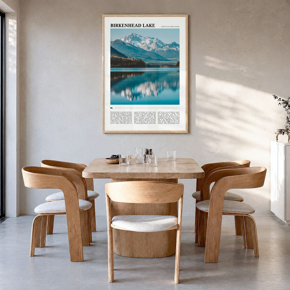 Birkenhead Lake Travel Poster in a natural wood frame, hanging in a dining room