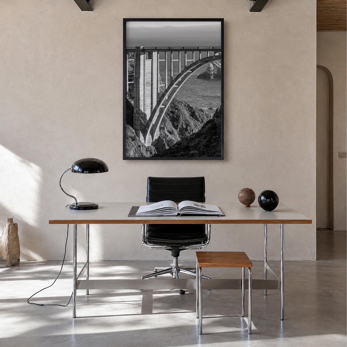 Bixby Creek Bridge black & white photo poster of California, USA – vertical wall art in black wood frame, hanging on wall