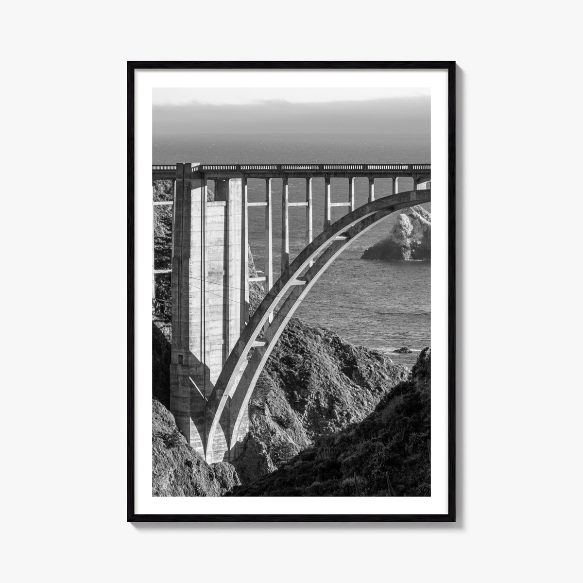 Bixby Creek Bridge black & white photo poster of California, USA – vertical wall art, unframed print shown in interior mockup