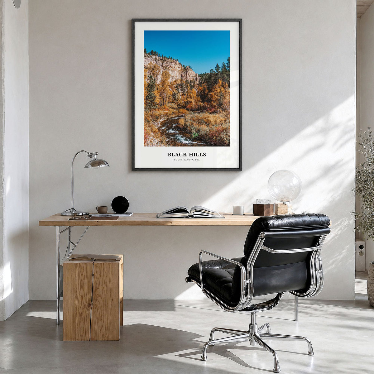 Black Hills Classic Poster in a black wood frame, hanging in a bright home office