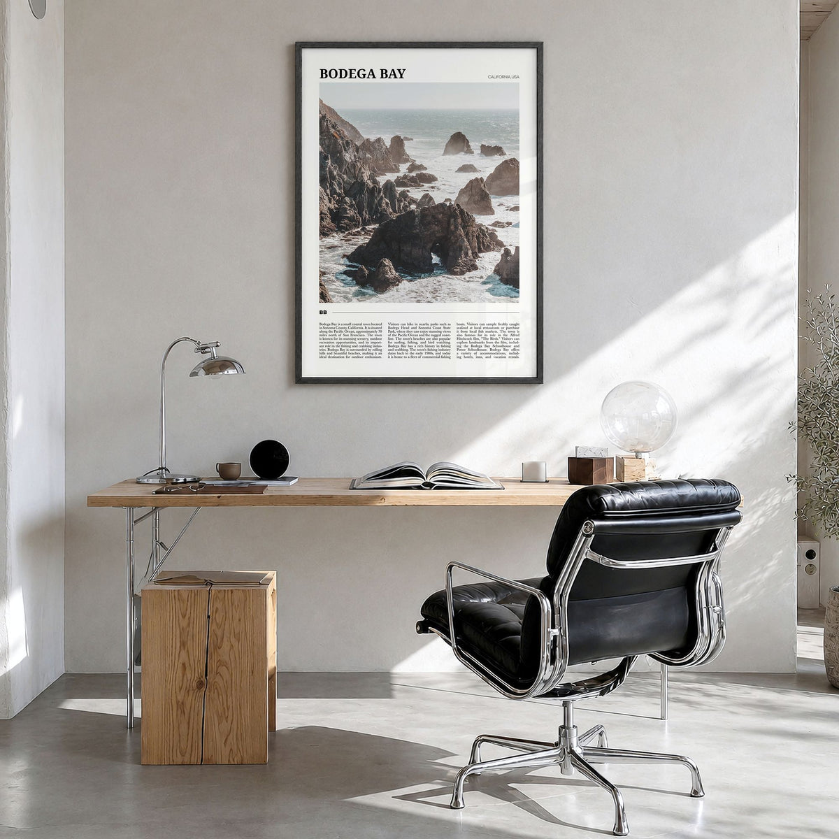 Bodega Bay Travel Poster in a black wood frame, hanging in a bright home office