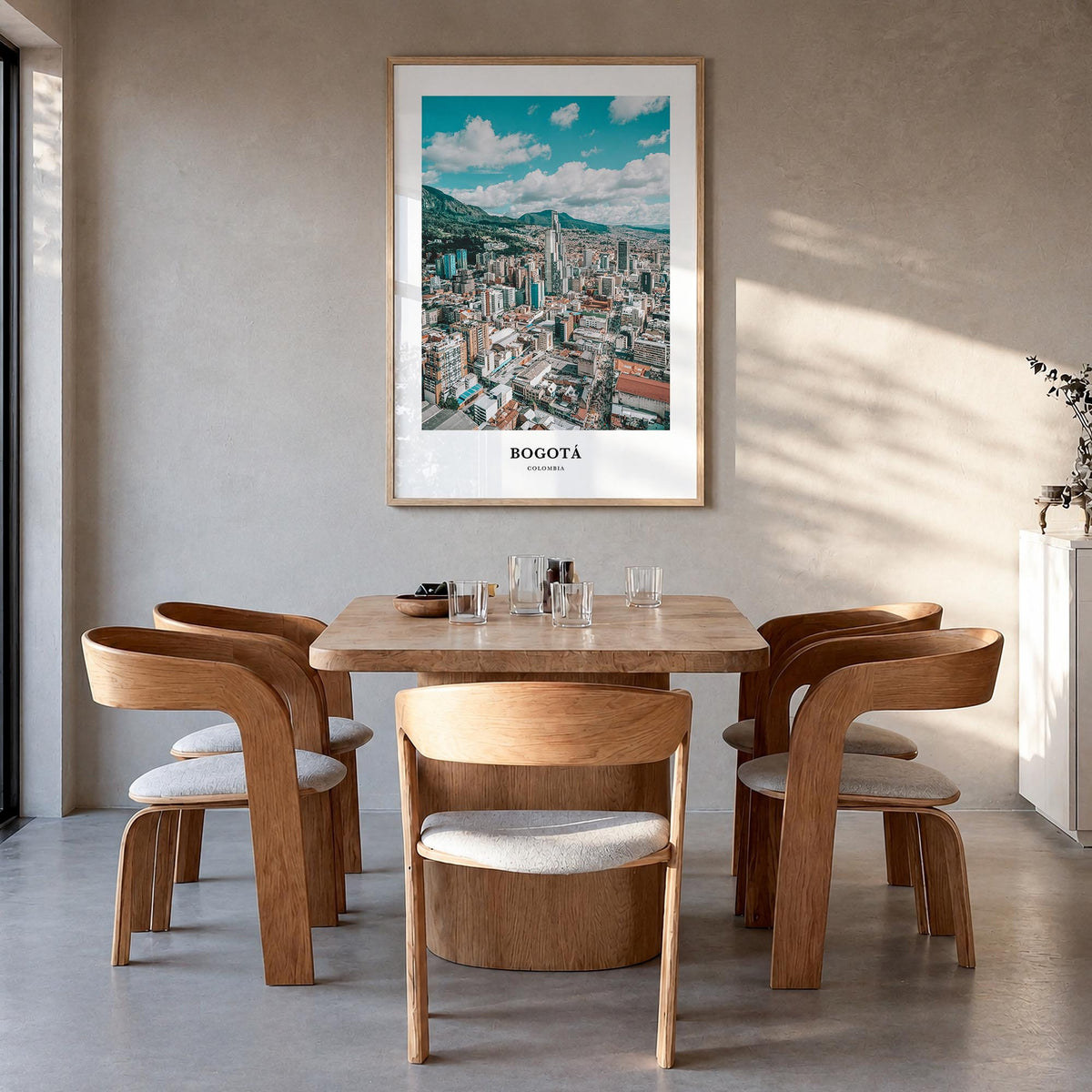 Bogotá colorful classic poster of Colombia – vertical wall art in natural wood frame, hanging on wall