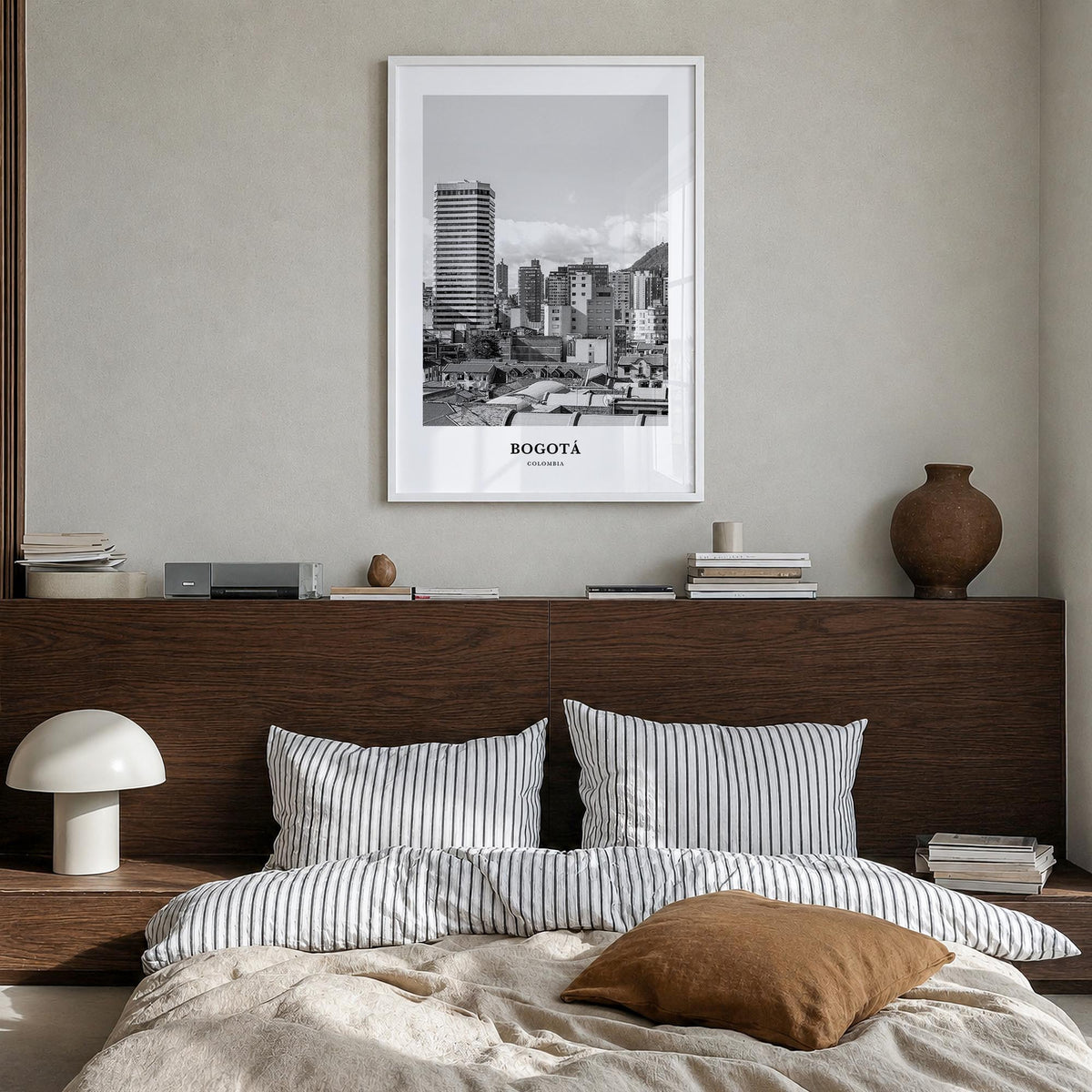 Bogotá no. 1 black & white classic poster of Colombia – vertical wall art in white wood frame, hanging on wall