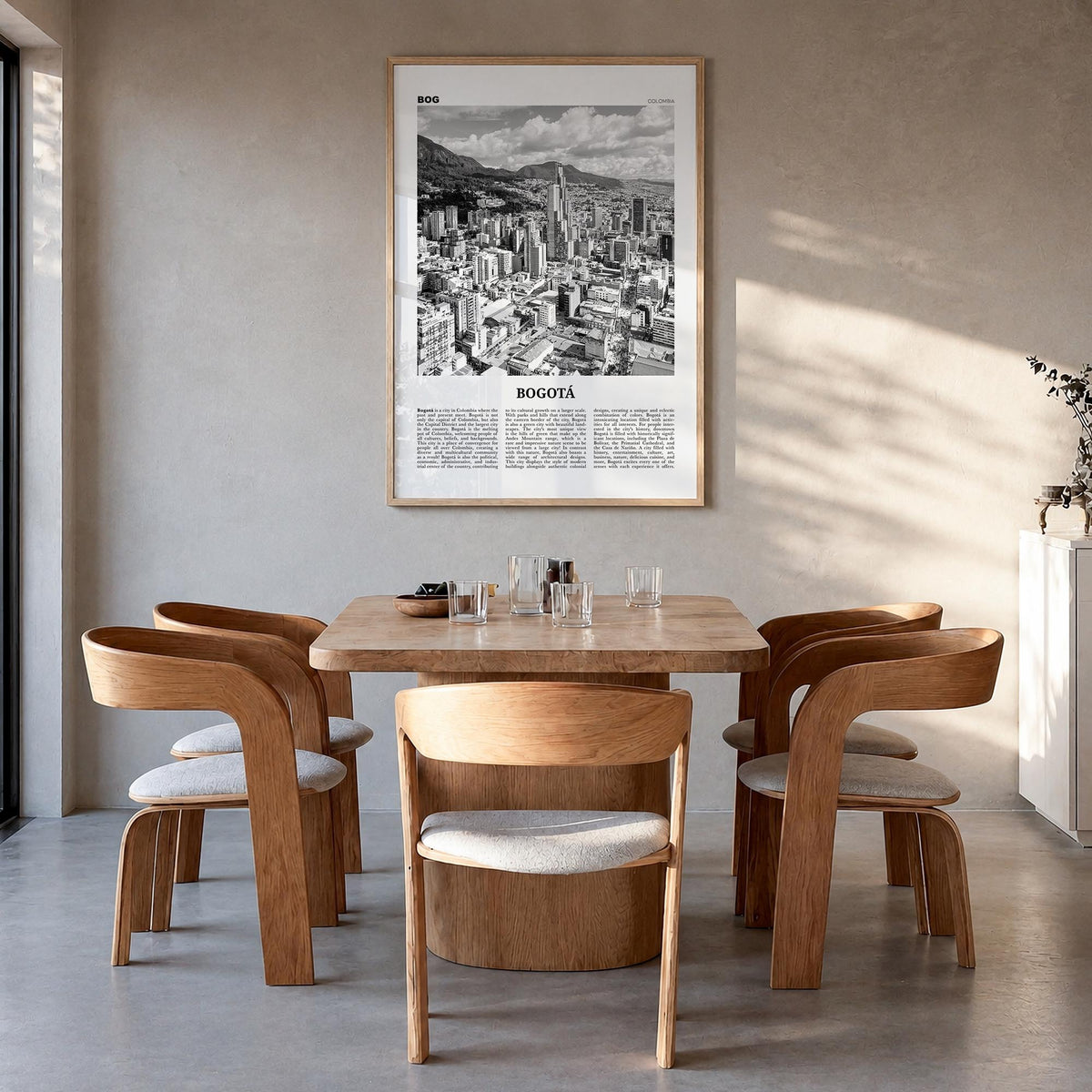 Bogotá no. 1 black & white newspaper poster of Colombia – vertical wall art in natural wood frame, hanging on wall