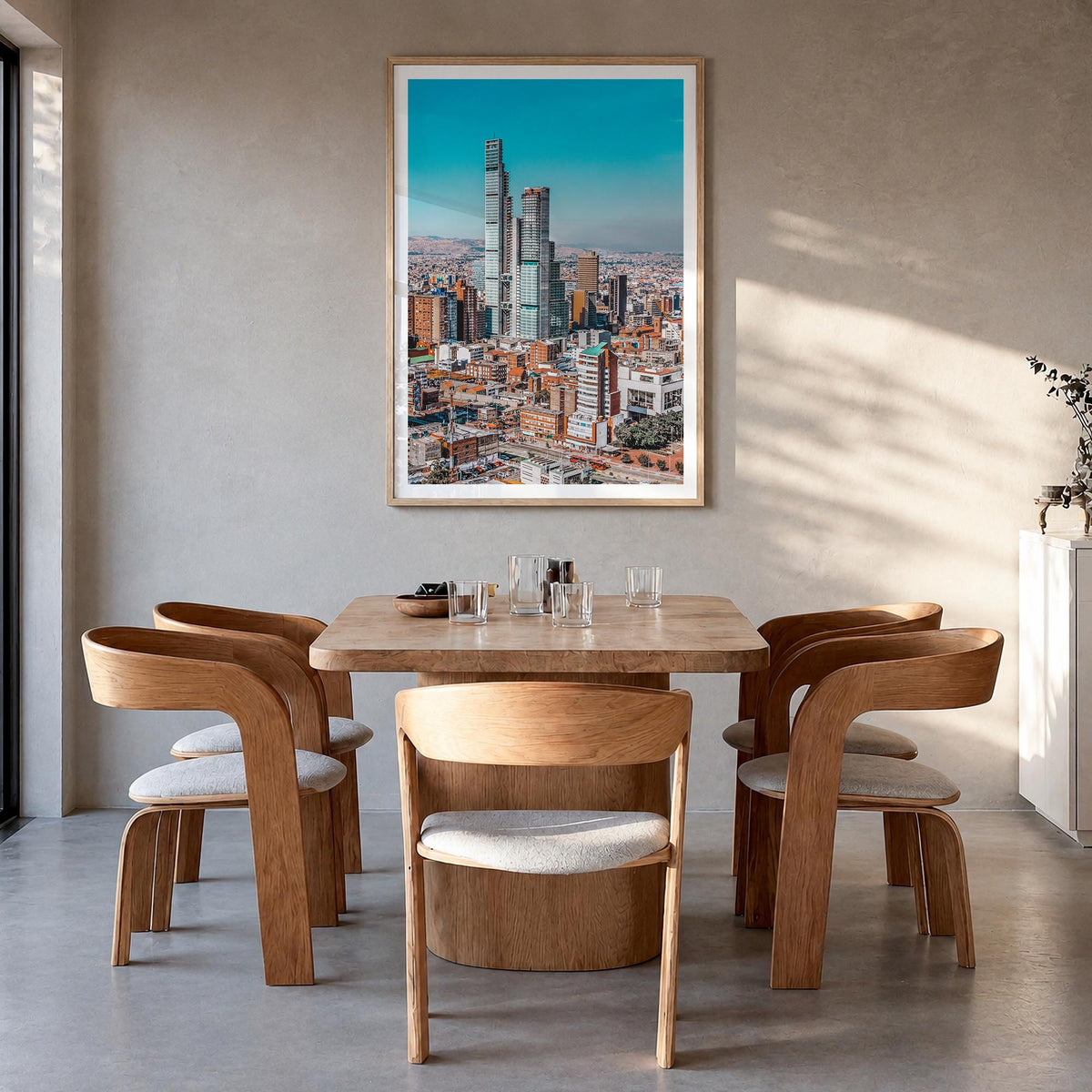 Bogotá no. 1 colorful photo poster of Colombia – vertical wall art in natural wood frame with white border, hanging on wall