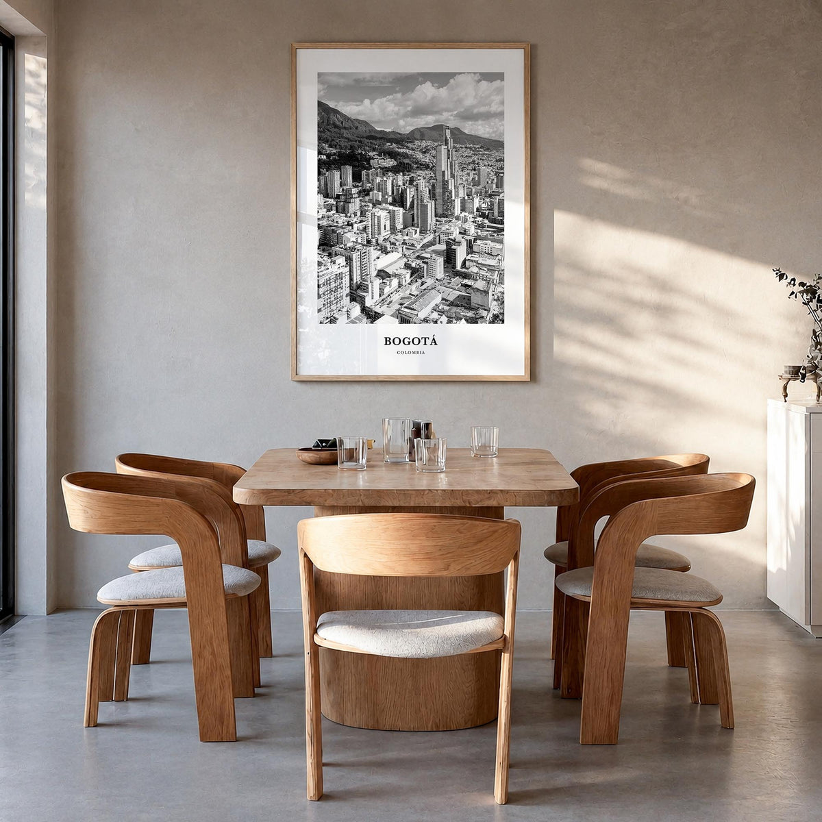 Bogotá no. 2 black & white classic poster of Colombia – vertical wall art in natural wood frame, hanging on wall